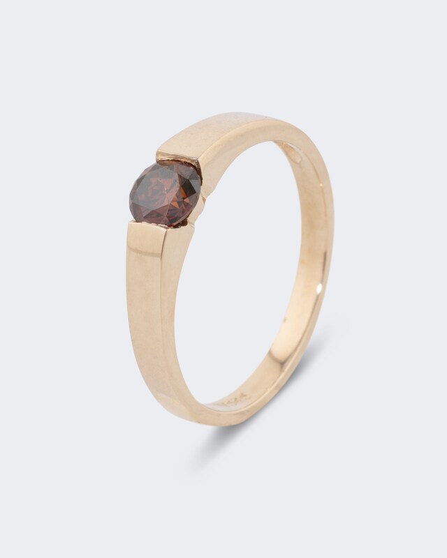 Ring mit rotem Brillant ca. 0,5 ct