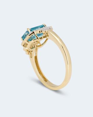 Ring mit blauem Zirkon und Diamant