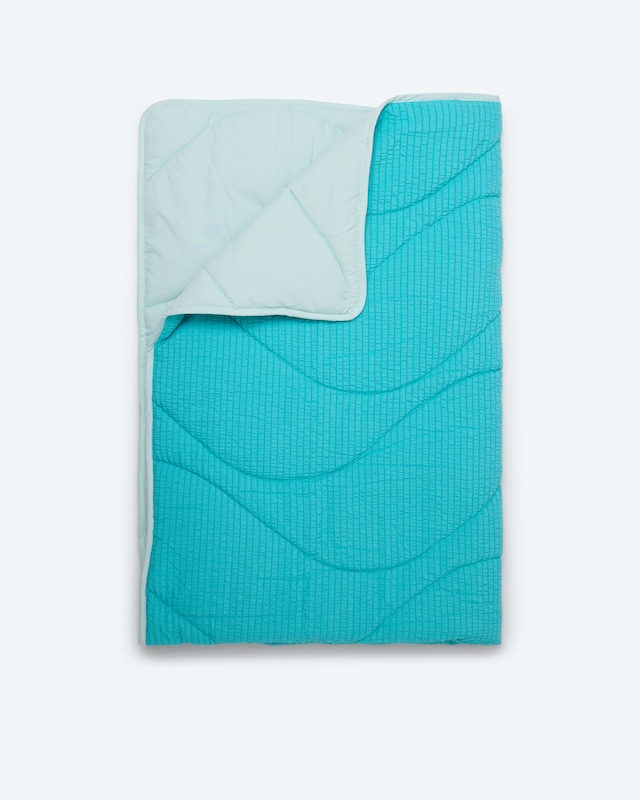 Seersucker und Peach Wendesteppbett