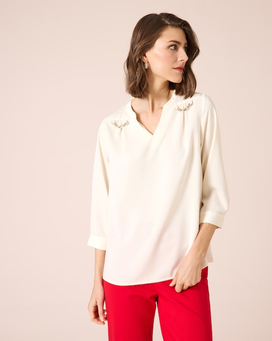 Produktabbildung für Blusenshirt mit Kettenverzierung