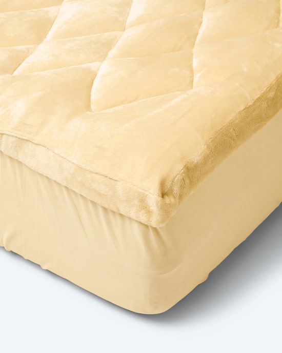 Produktabbildung für Komfort-Auflage "Cozy" in Lammfell-Optik