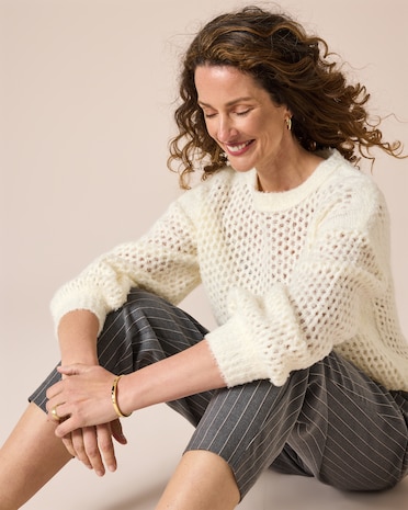 Produktabbildung für Pullover mit Lochstruktur