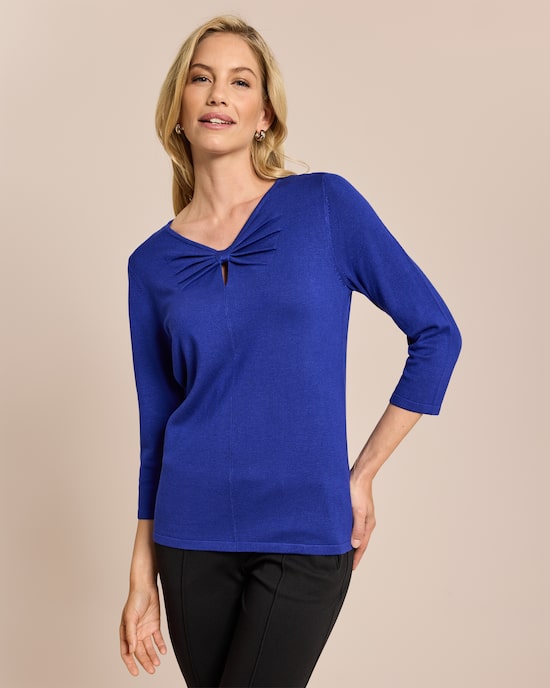 Produktabbildung für Pullover mit Schleife am Ausschnitt