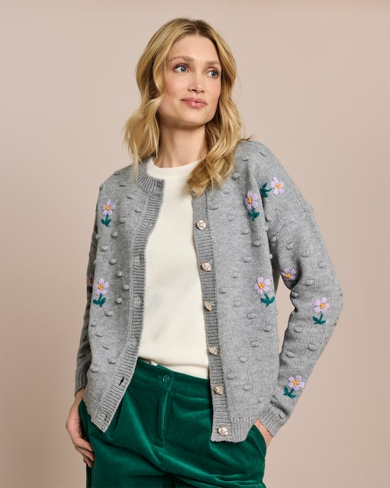 Produktabbildung für Cardigan mit Blumen und Pompoms