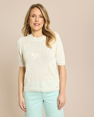 Produktabbildung für Pullover mit Schleifen und Perlen