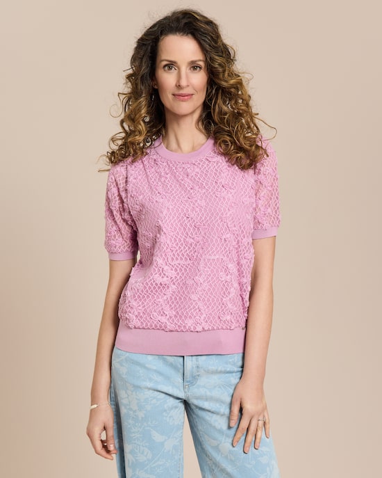 Produktabbildung für Pullover mit Rosenapplikationen