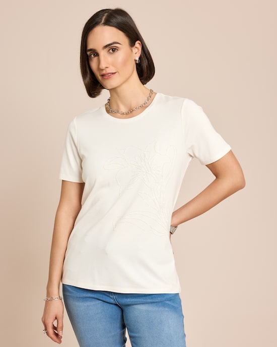 Produktabbildung für Shirt mit Blumen-Applikation