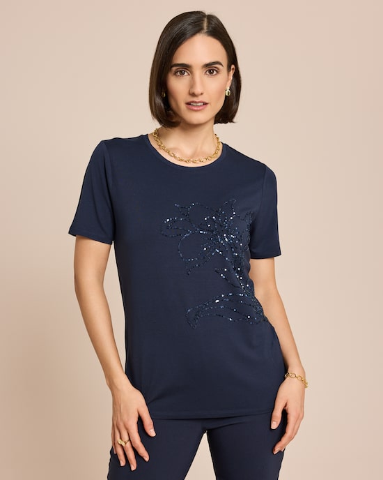 Produktabbildung für Shirt mit Blumen-Applikation