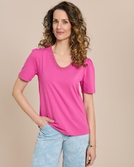 Produktabbildung für Shirt mit Blütenspitze am Ausschnitt