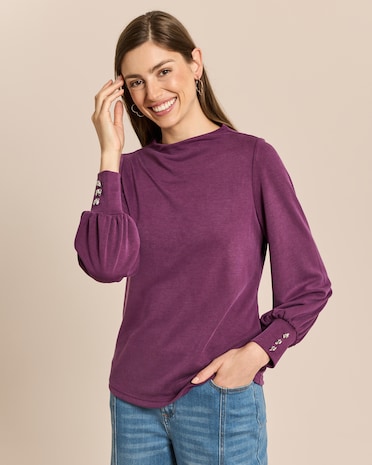 Produktabbildung für Shirt mit Ballonarm und Zierknöpfen