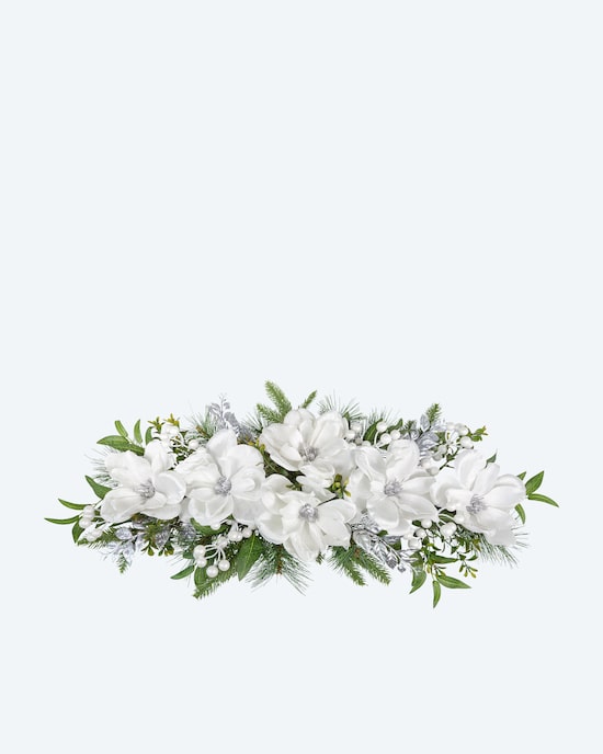 Produktabbildung für Magnoliengesteck mit Kerzenhalter