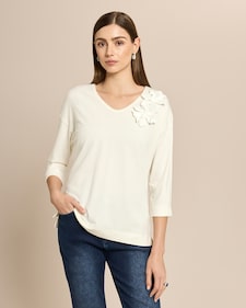 Produktabbildung für Shirt mit Blumenapplikation