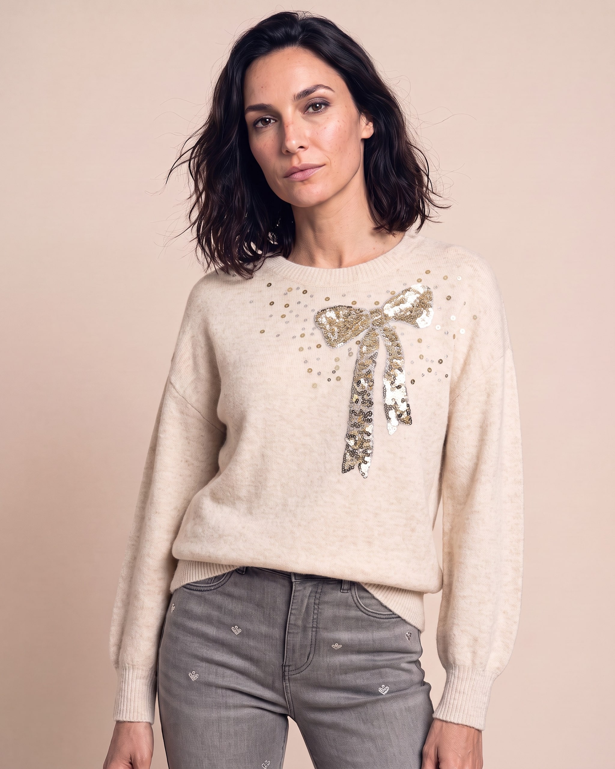 Produktabbildung für Pullover mit Paillettenschleife